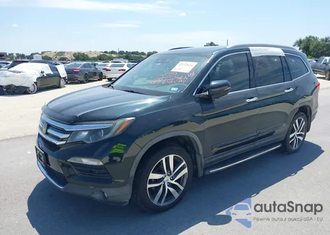 2017 Honda Pilot Touring z USA, uszkodzony, nr VIN 5FNYF6H98HB009808